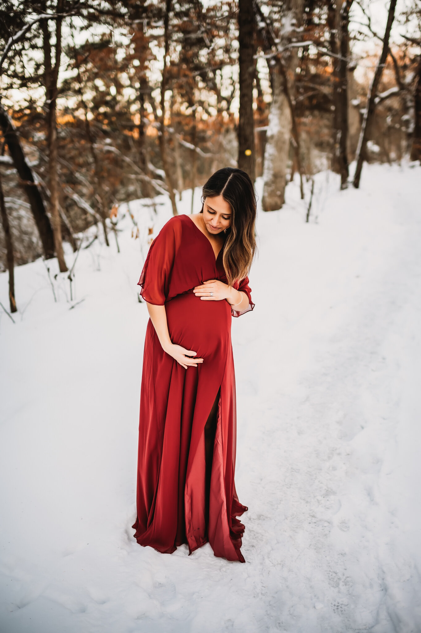 pregnant mom wears red dress peoria IL photographer maternity session