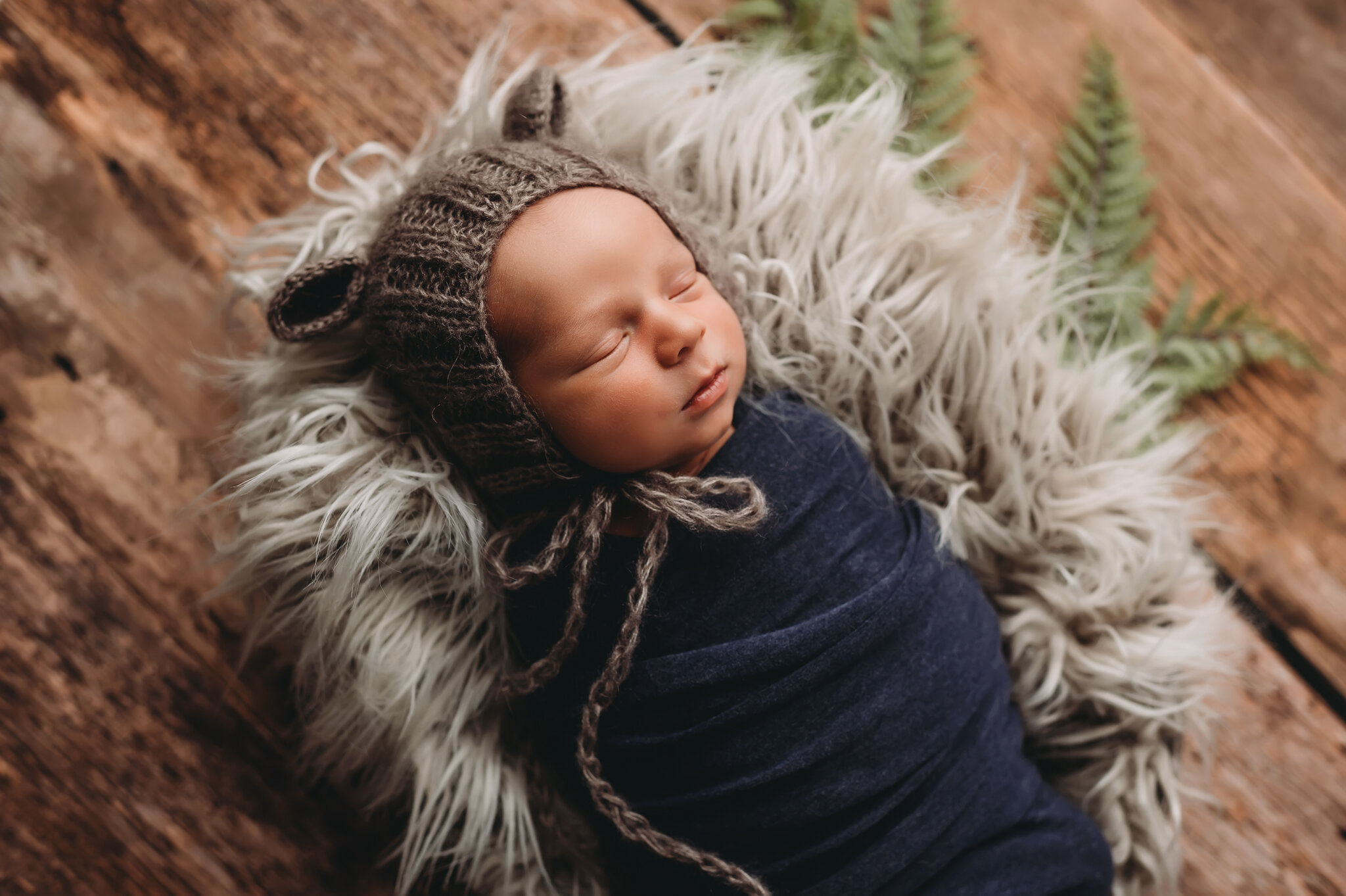 Peoria Newborn photographer baby in bear hat.jpg