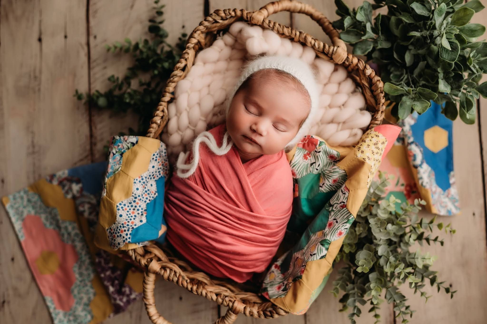 Newborn photo peoria baby with quilt in pink.jpg
