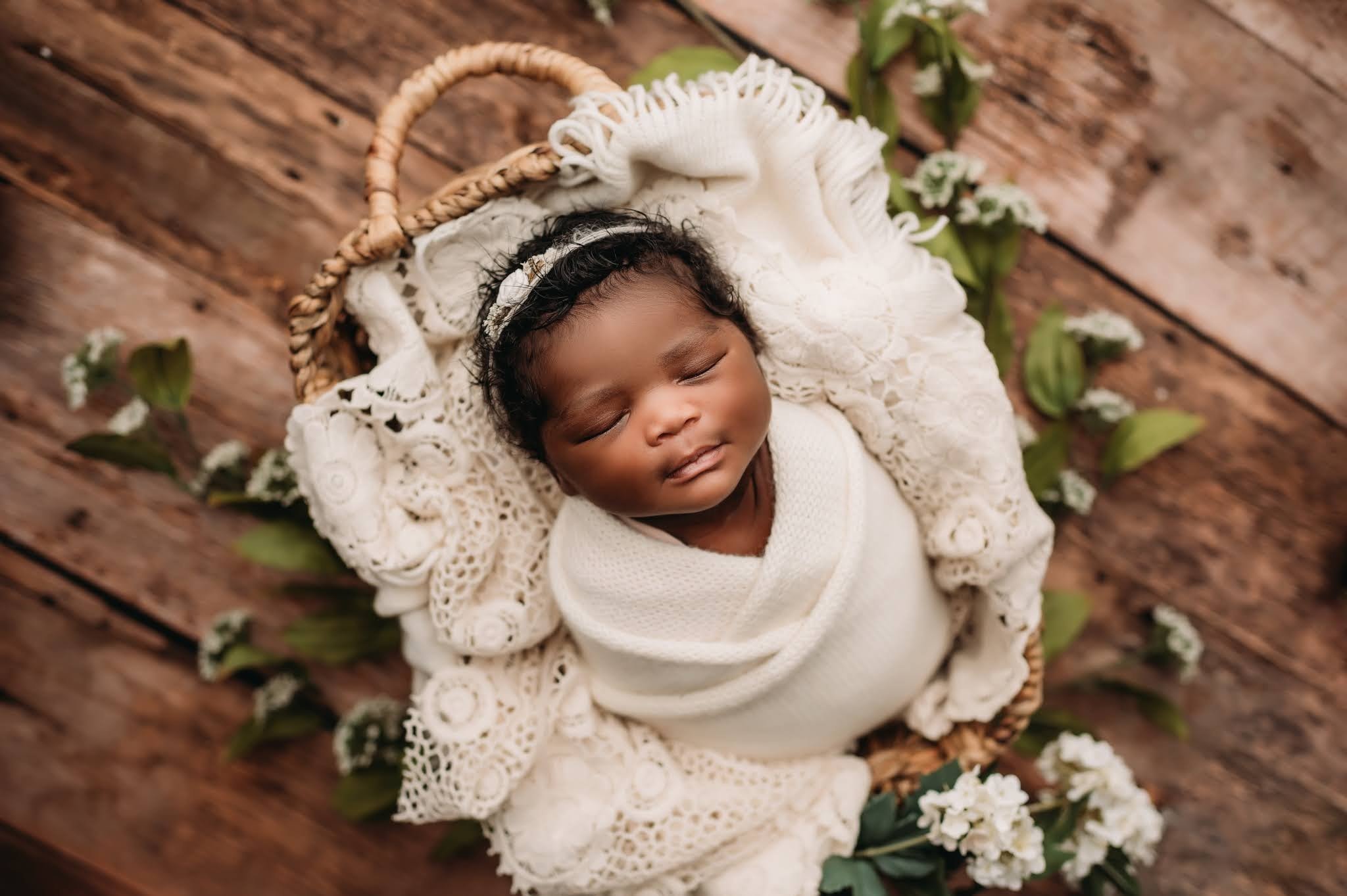 Peoria newborn photographer baby in basket.jpg