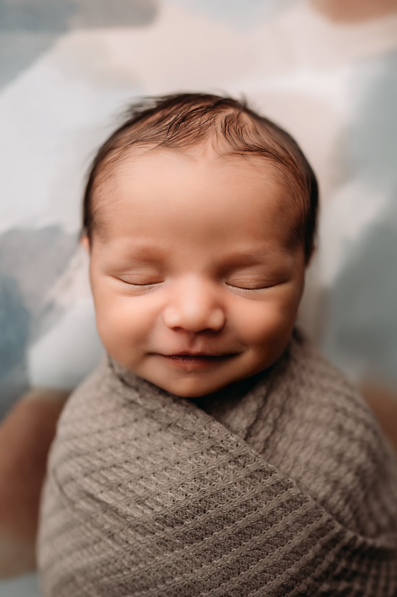 Newborn smiles.jpg