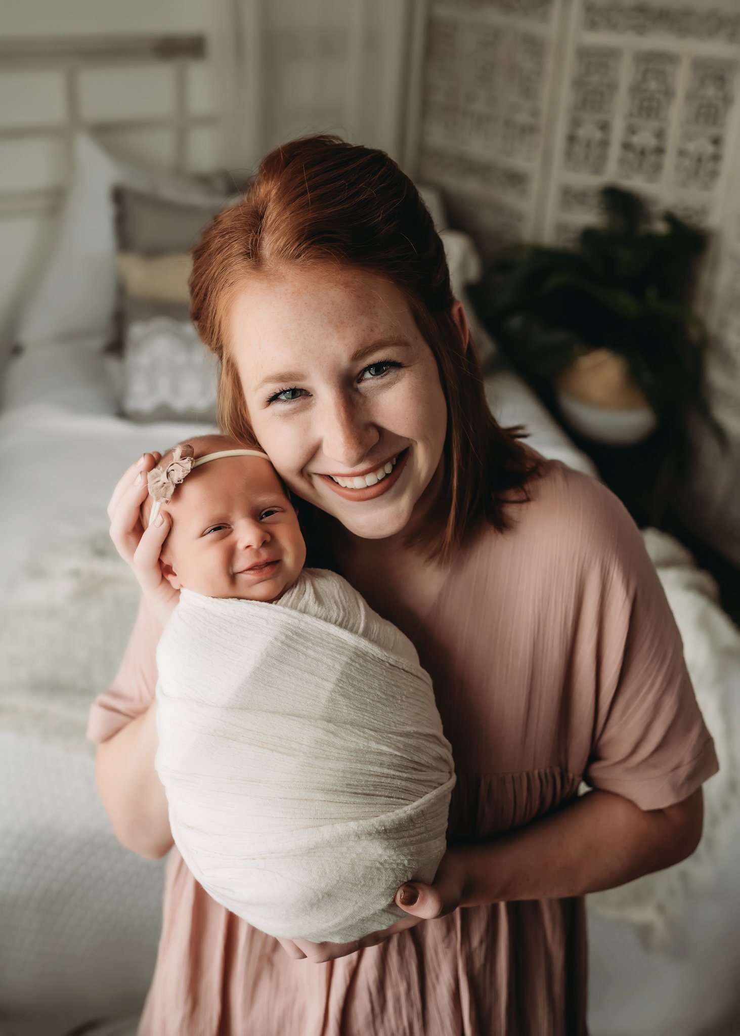 Peoria newborn baby smiles.jpg